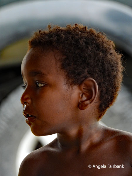 boy facing left