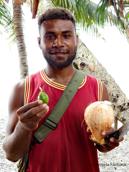 man with betel nut and coconut