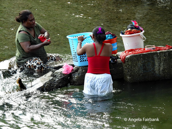 women washing clothes