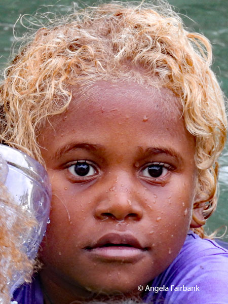blonde girl in water