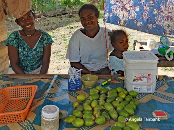 fruit sellers opposite cacao farm
