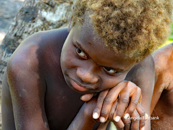 boy leaning on his hands