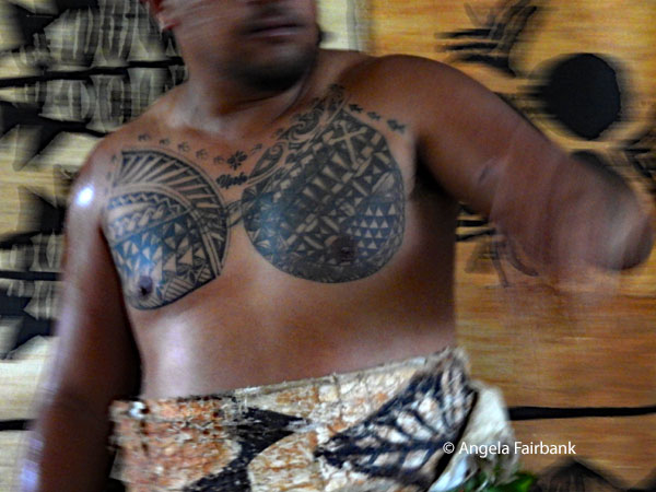 male dancer two breast tattoos