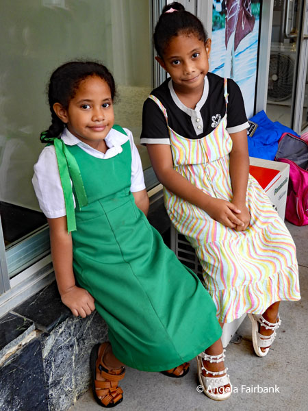two little girls outside our hotel
