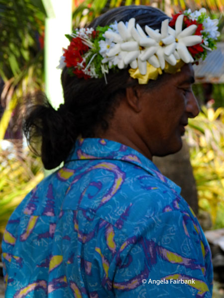 me wearing a fou of flowers on arrival