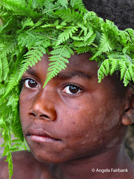 boy with ferns