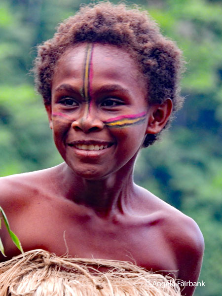 smiling girl with face paint