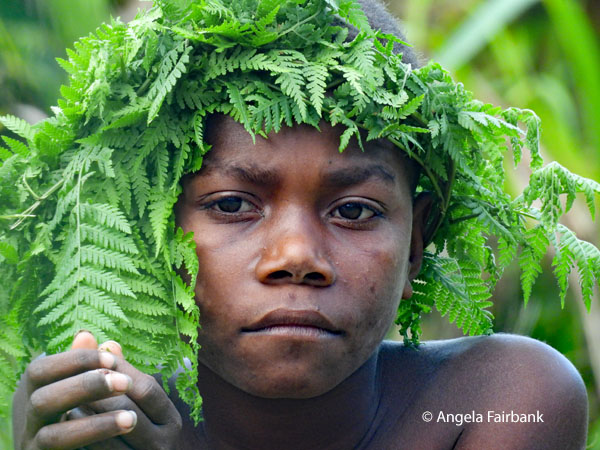 boy with ferns and hands