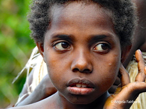 girl with hand on left cheek