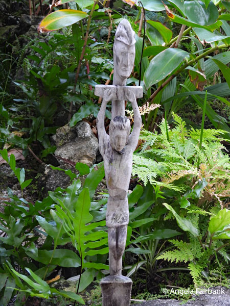 wooden statue in resort garden