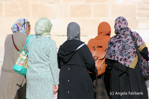 backs of five women