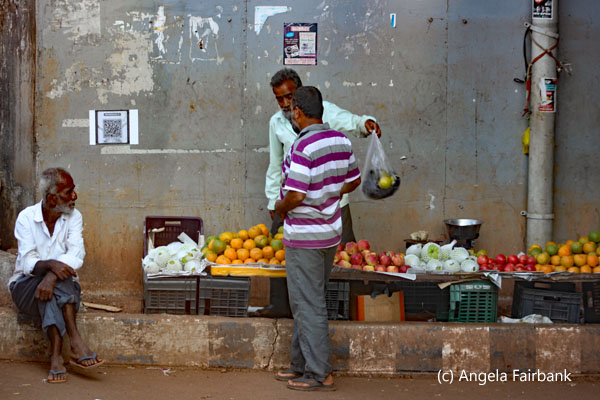 men at market under bridge