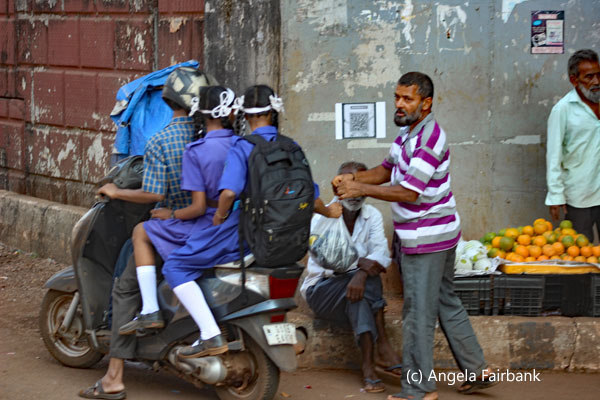 three on motorcycle shopping