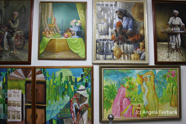 a wall of paintings