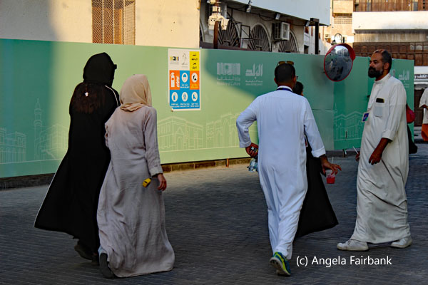 locals walking in al balad