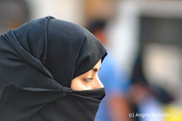 face of woman in black