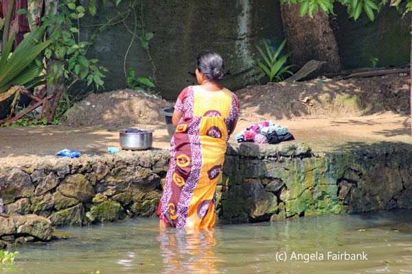 woman washing clothes