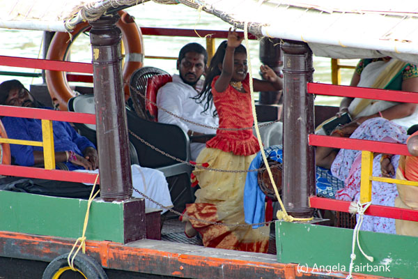 girl dancing in boat