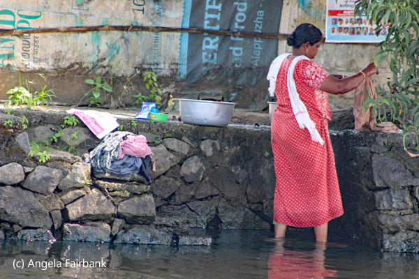 woman washing clothes