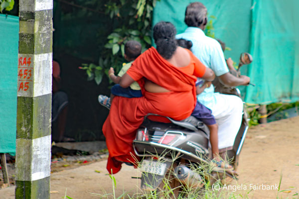 family of 5 on motorbike