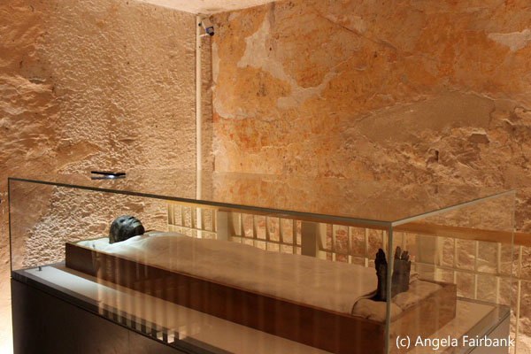 Mummified Tut in glass case