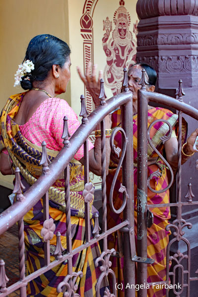 2 women at monastery