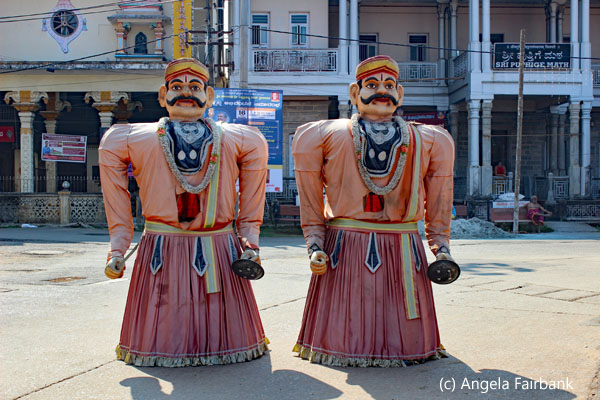 two giant male effigies