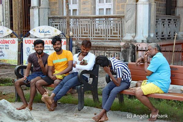 5 men sitting