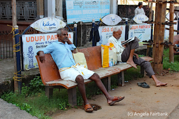 2 men sitting