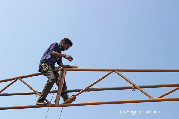 man working up high