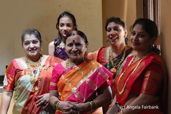 five women standing