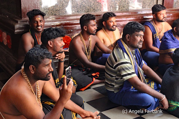 7 men sitting