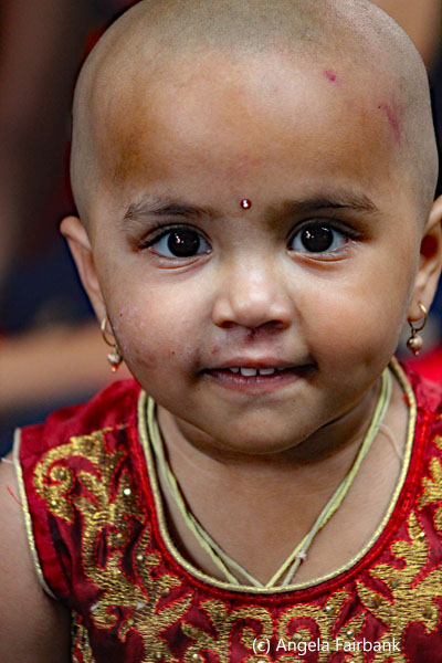 bald child smiling
