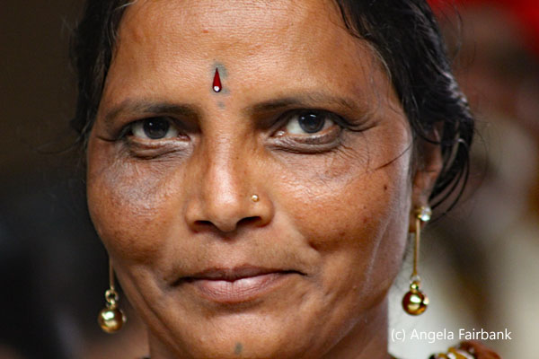 woman with long earrings
