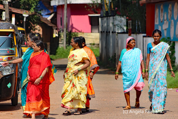 6 women in parking area