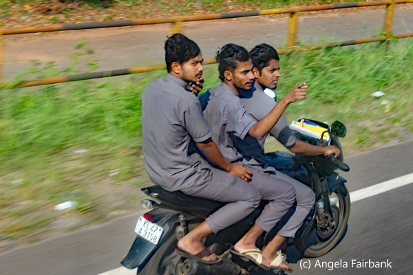 3 men on motorcycle