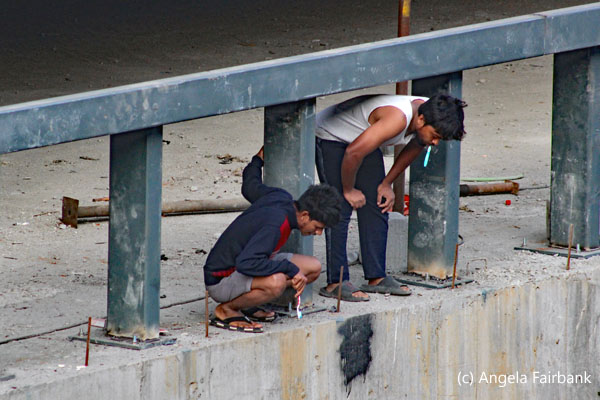 2 workers looked down