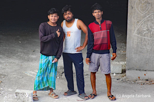 3 workers posing