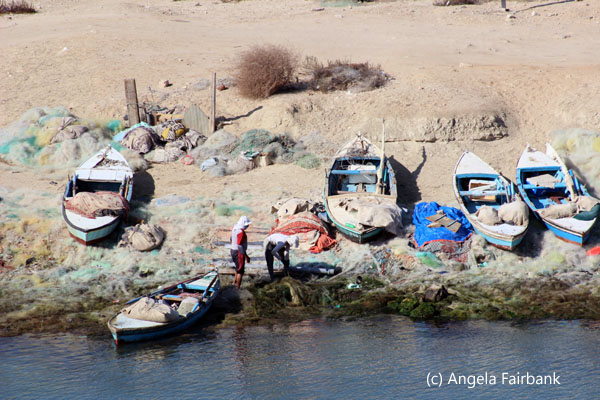 fishers on land and boats
