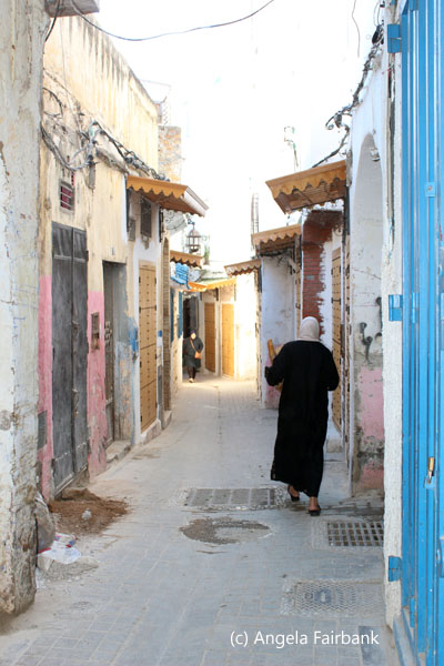 woman walking down street 2