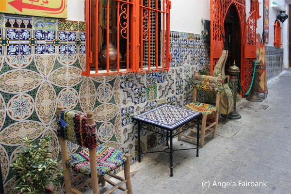 tables and chairs on street