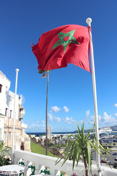 moroccan flag with palm tree and mosque tower